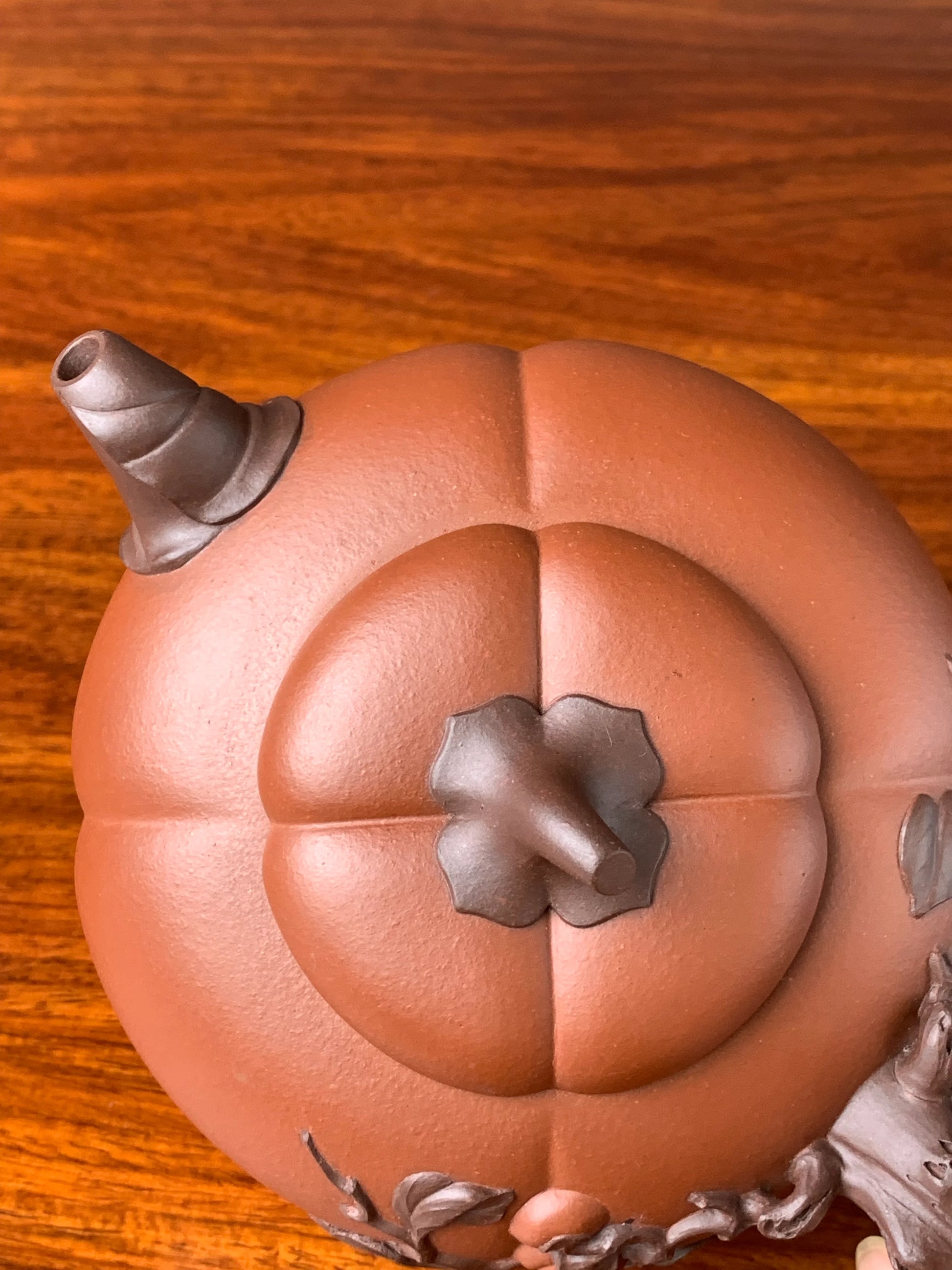 top view of art collection teapot named pumpkin on the table