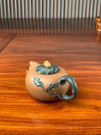 the artistic teapot on the table right view