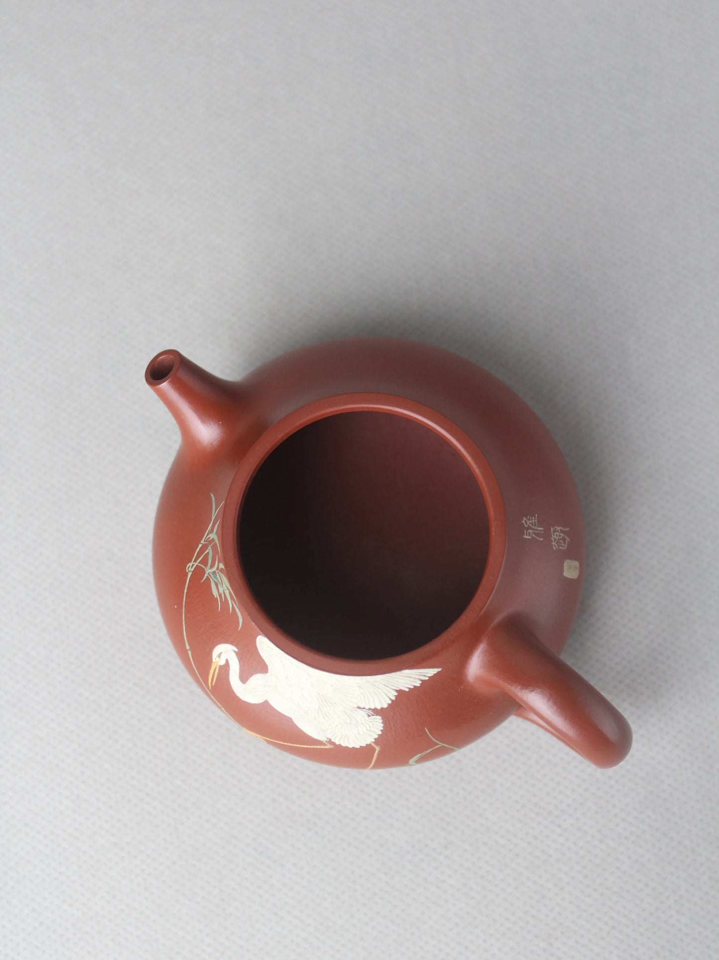 the mouth of the artwork teapot named "Egret," 