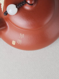 the detail of the the artwork teapot handmade by the artist