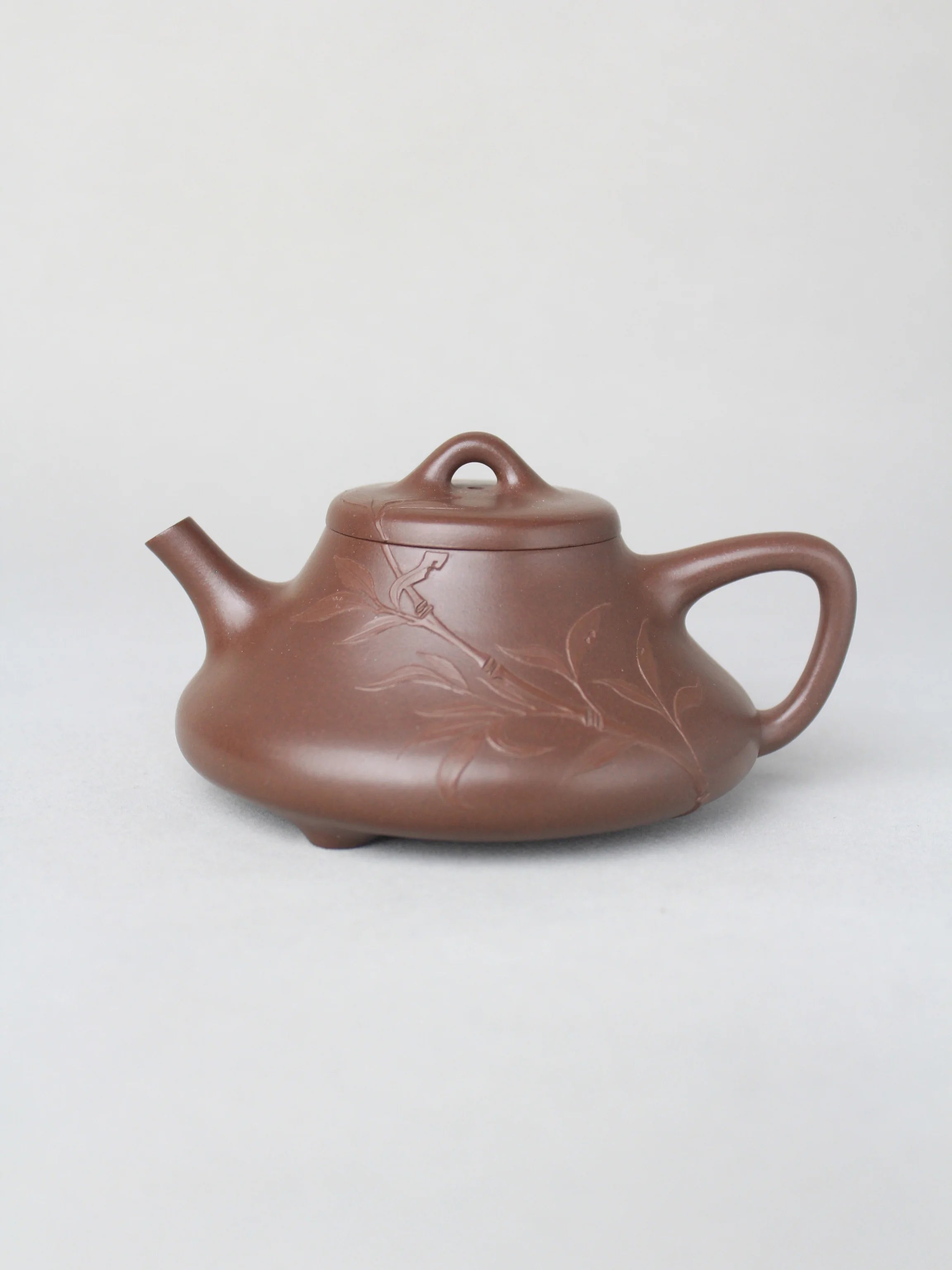 Artwork teapot shi piao on the table