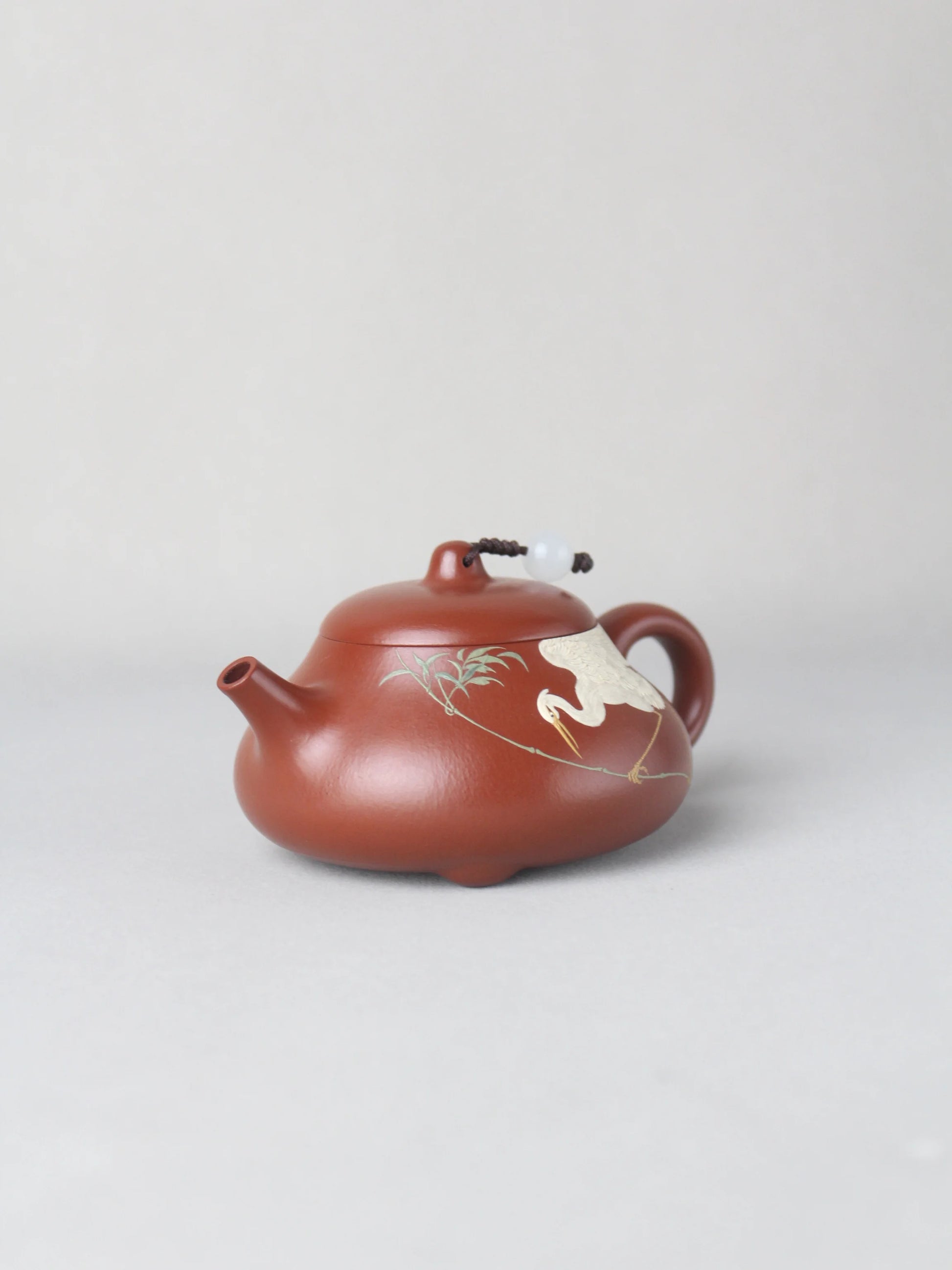 The right view of artwork teapot named "Egret," handmade by the artist