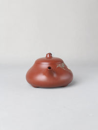 The front view of artwork teapot named "Egret," handmade by the artist
