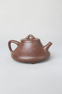 the back view of the artwork teapot shi piao