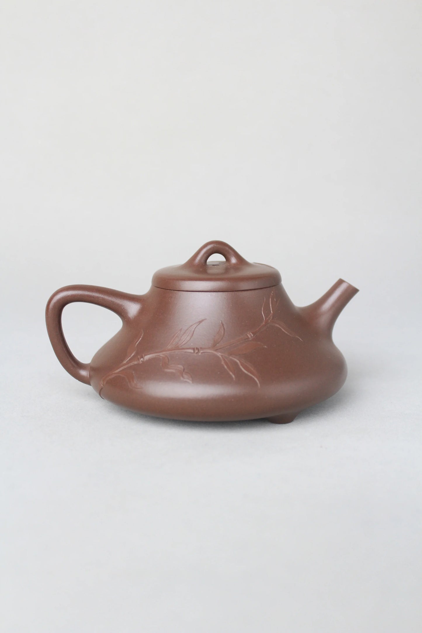 the artwork teapot named shi piao back view