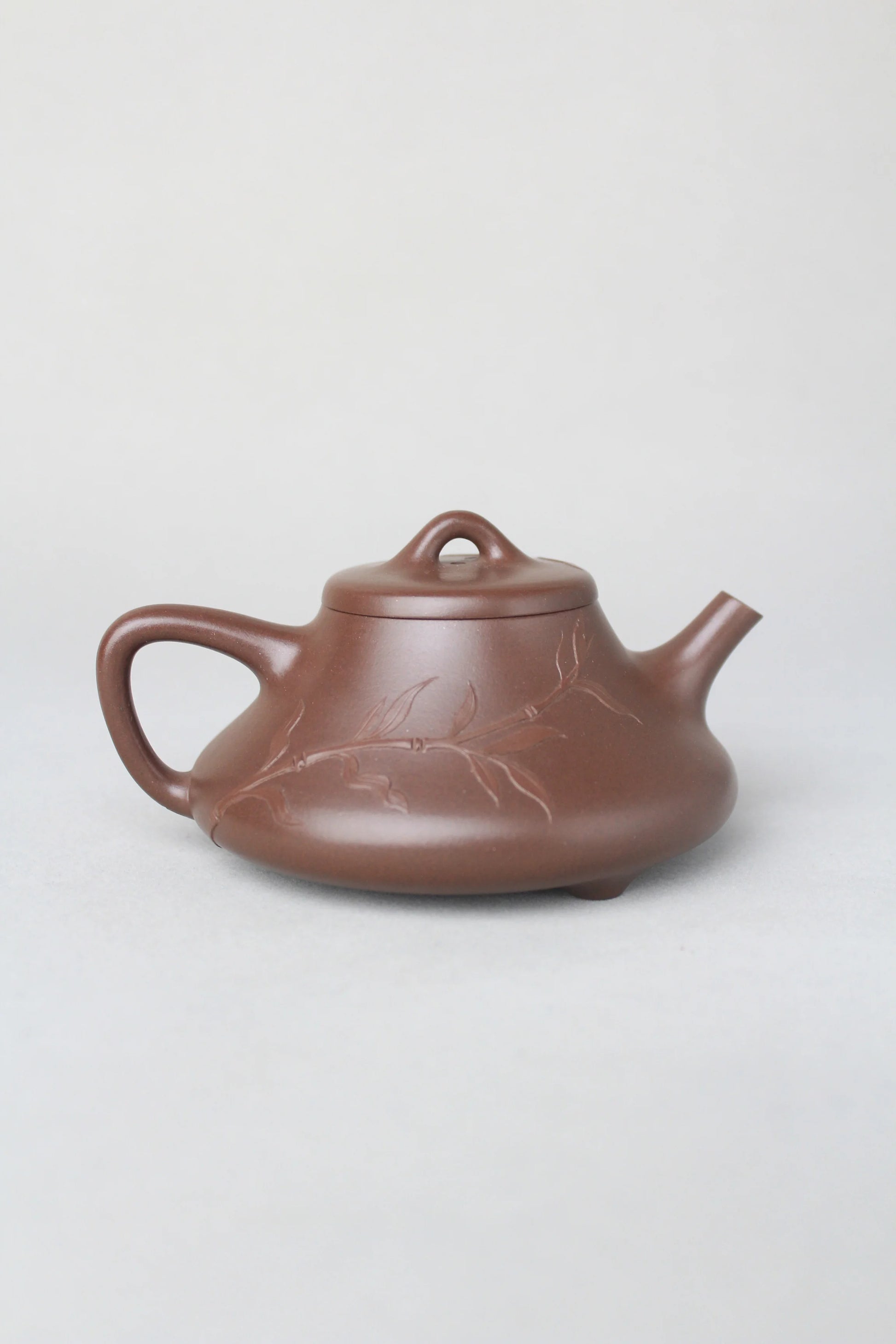the artwork teapot named shi piao back view