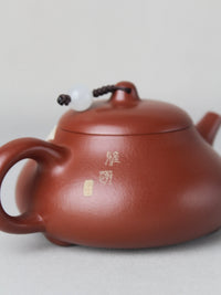 The detail of the artwork teapot named "Egret," 