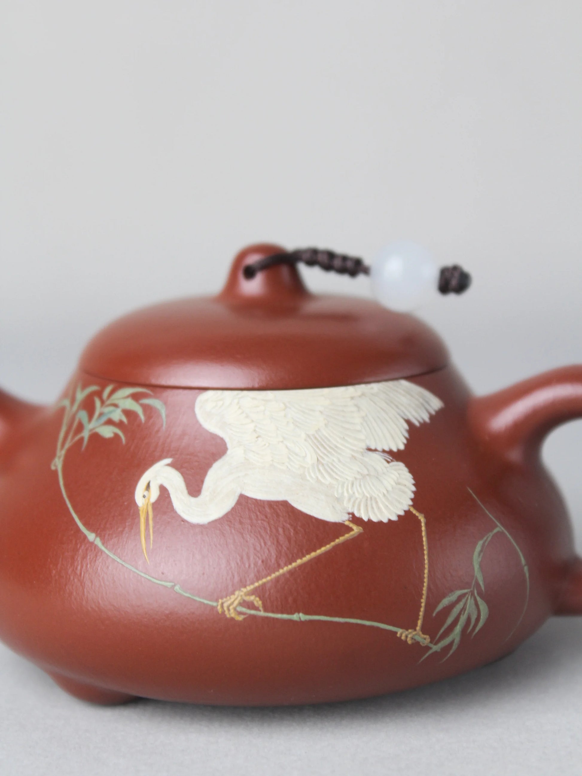 the painting on the art teapot named "Egret," 