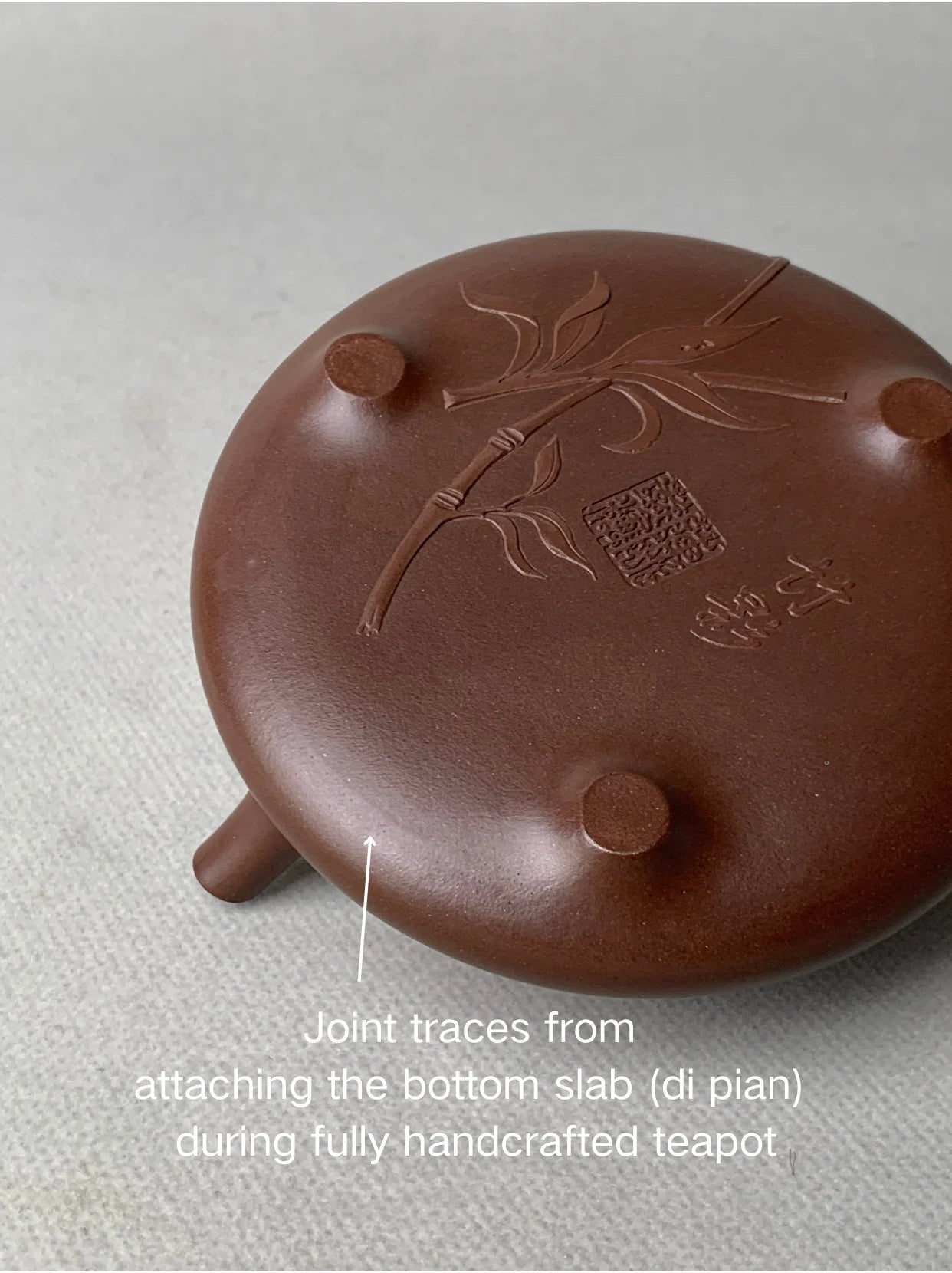 Joint traces from attaching the bottom slab (di pian) during fully handcrafted teapot