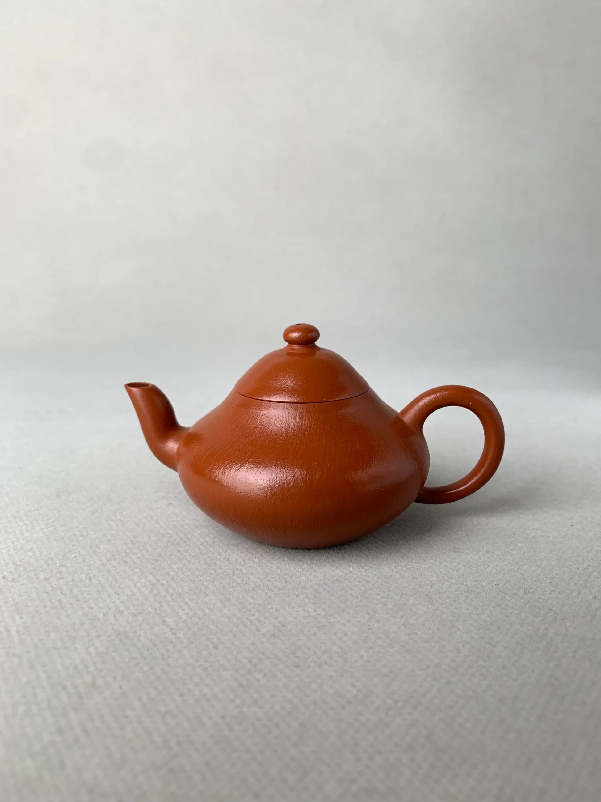 authentic yixing teapot named li xing on the table