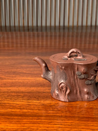 the spout of the beautiful teapot named pine tree