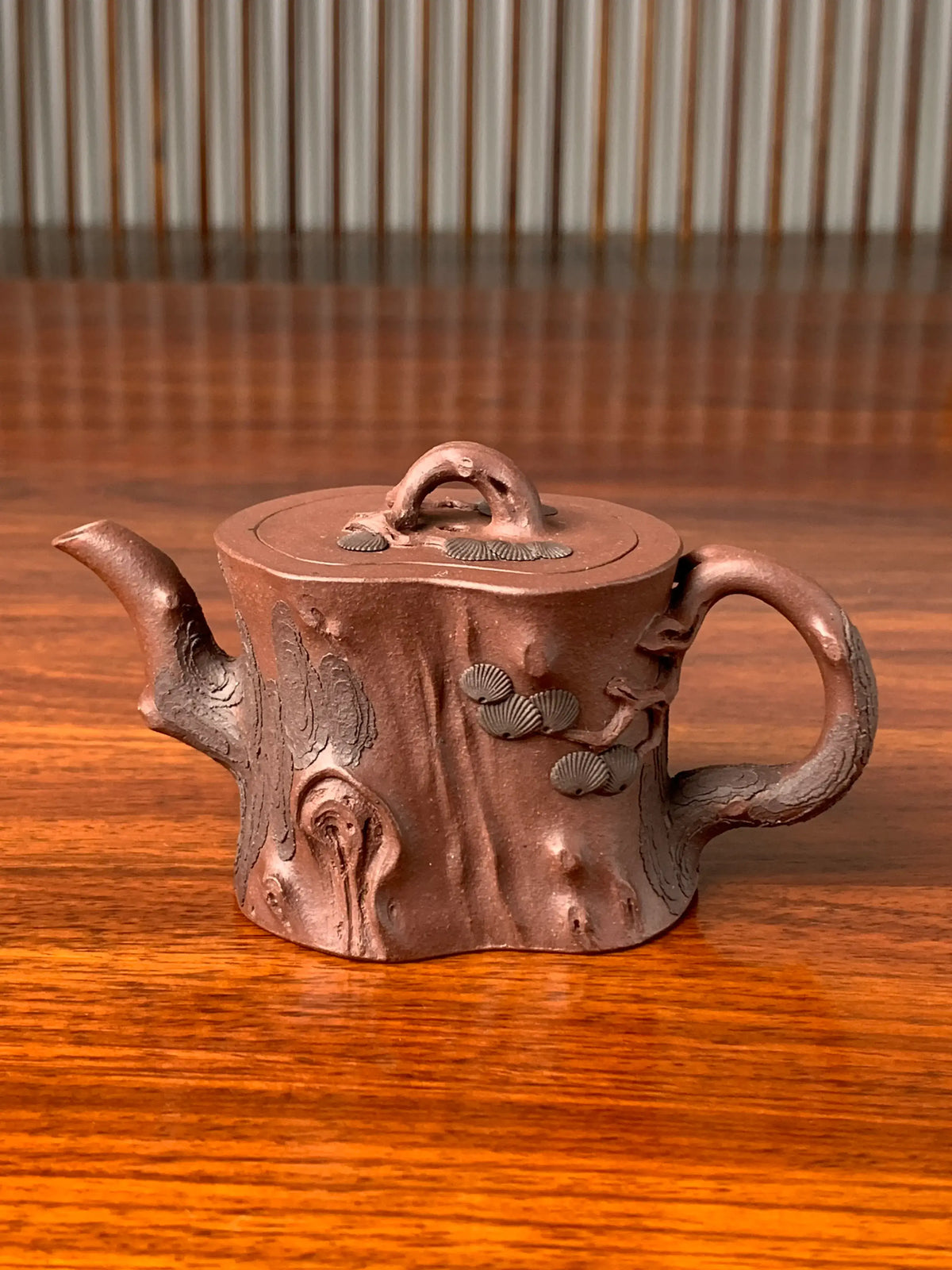 Take a close look at the exquisite craftsmanship of this beautiful teapot