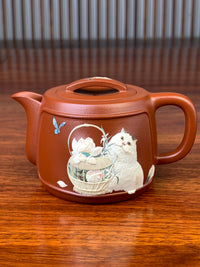 front view of the beautiful teapot with cat & flower painting