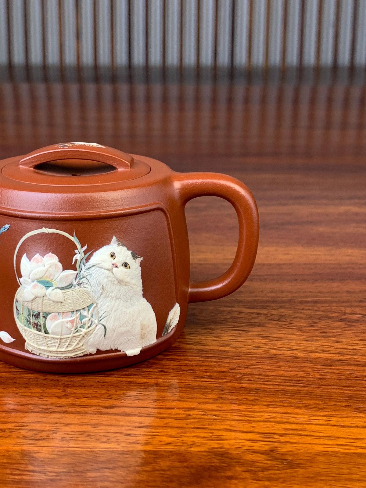 the handle of the beautiful teapot