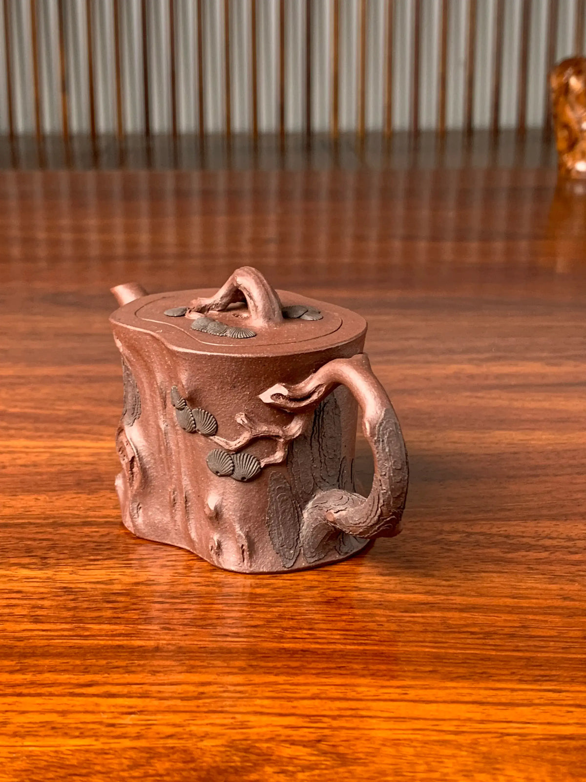 Right-side view of this beautiful teapot called Pine Tree