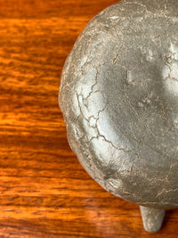 Close-up photo of the teapot bottom