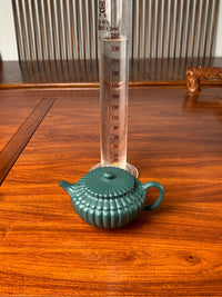 the capacity of the teapot zisha yun bian is 245ml