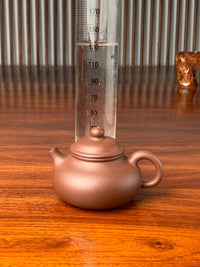 the capacity of the yixing zisha clay teapot rong tian is 135ml