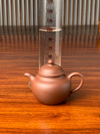 the capacity of the handmade yixing teapot gao lian zi is 112ml
