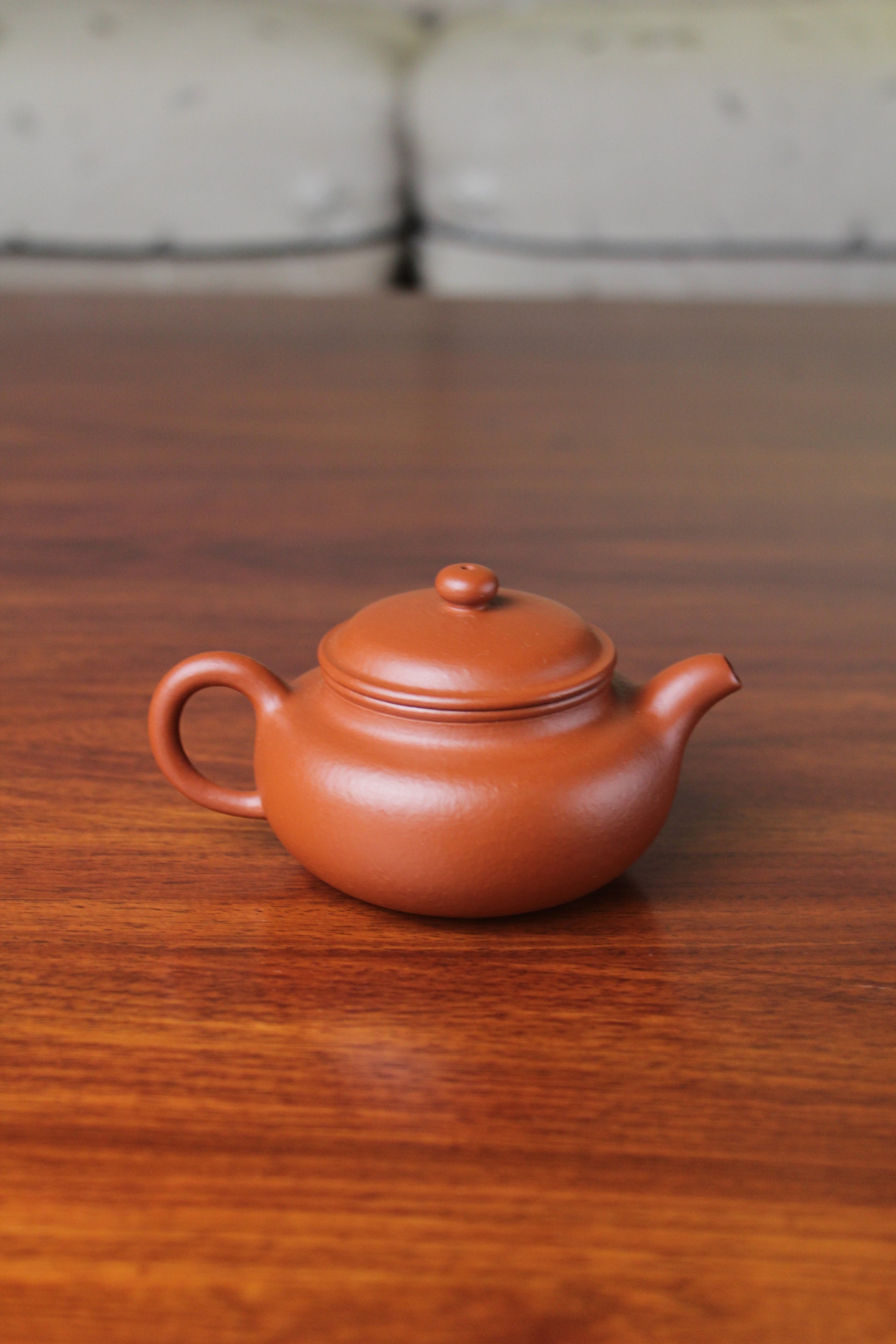 back of chinese teapot fang gu on the table