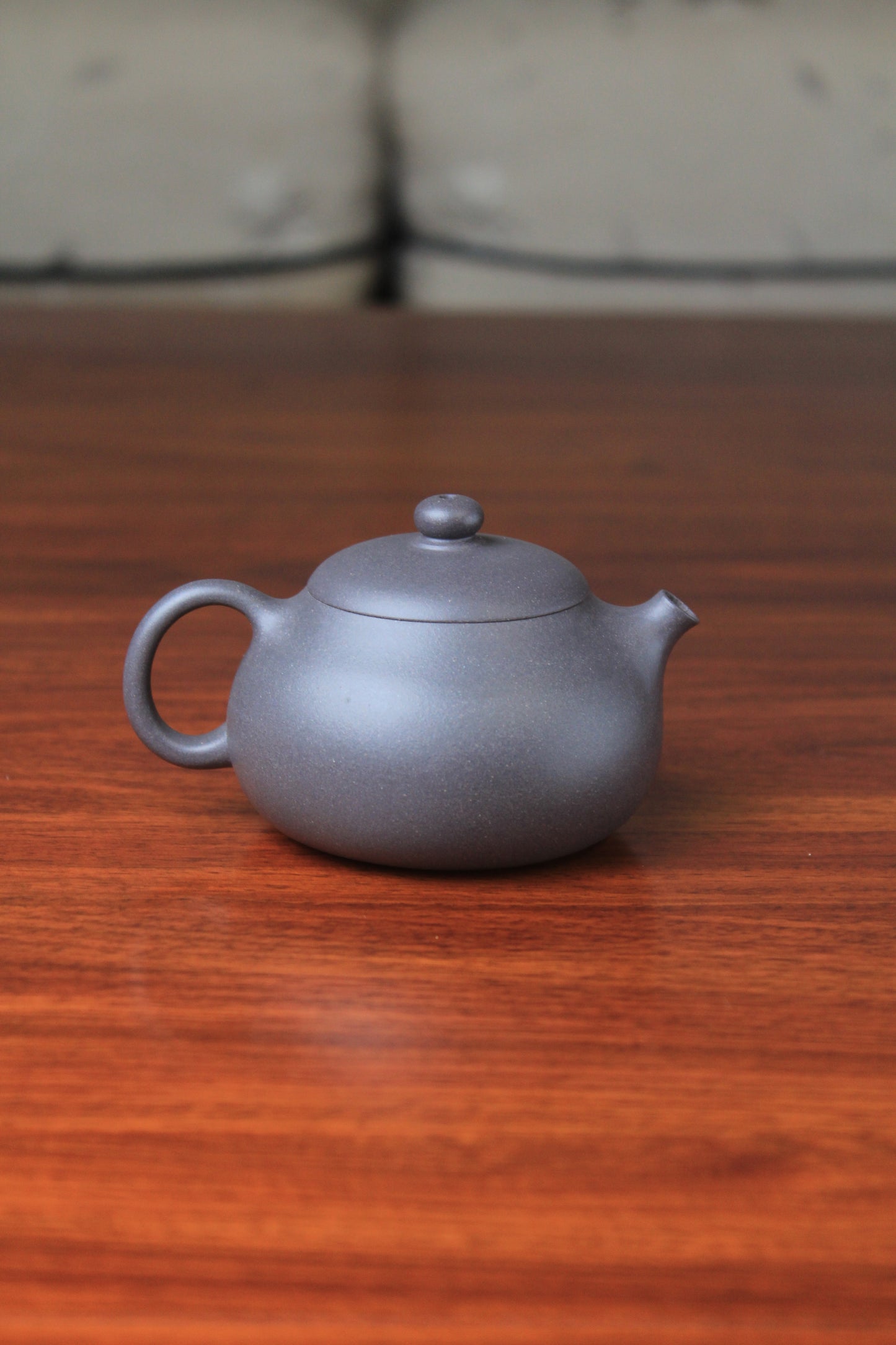 Back of chinese teapot xishi on the table 