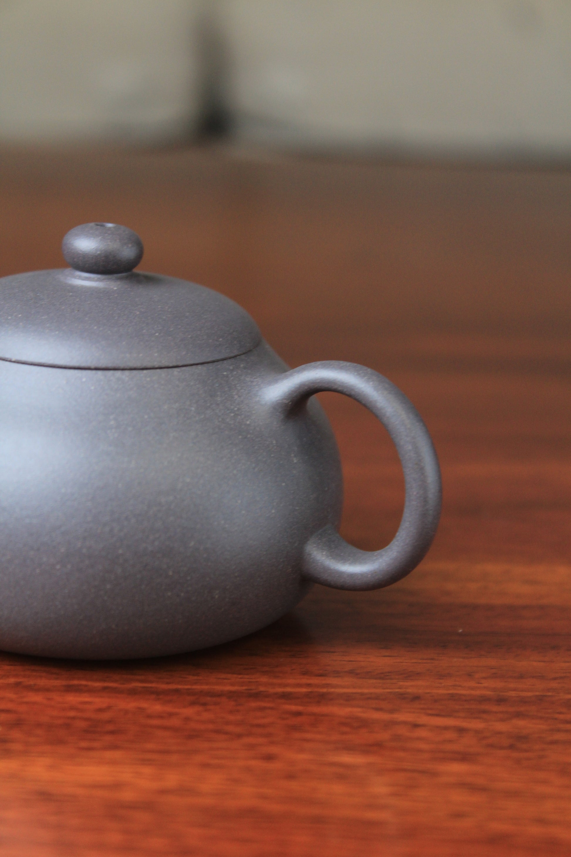 handle of chinese teapot xishi on the table