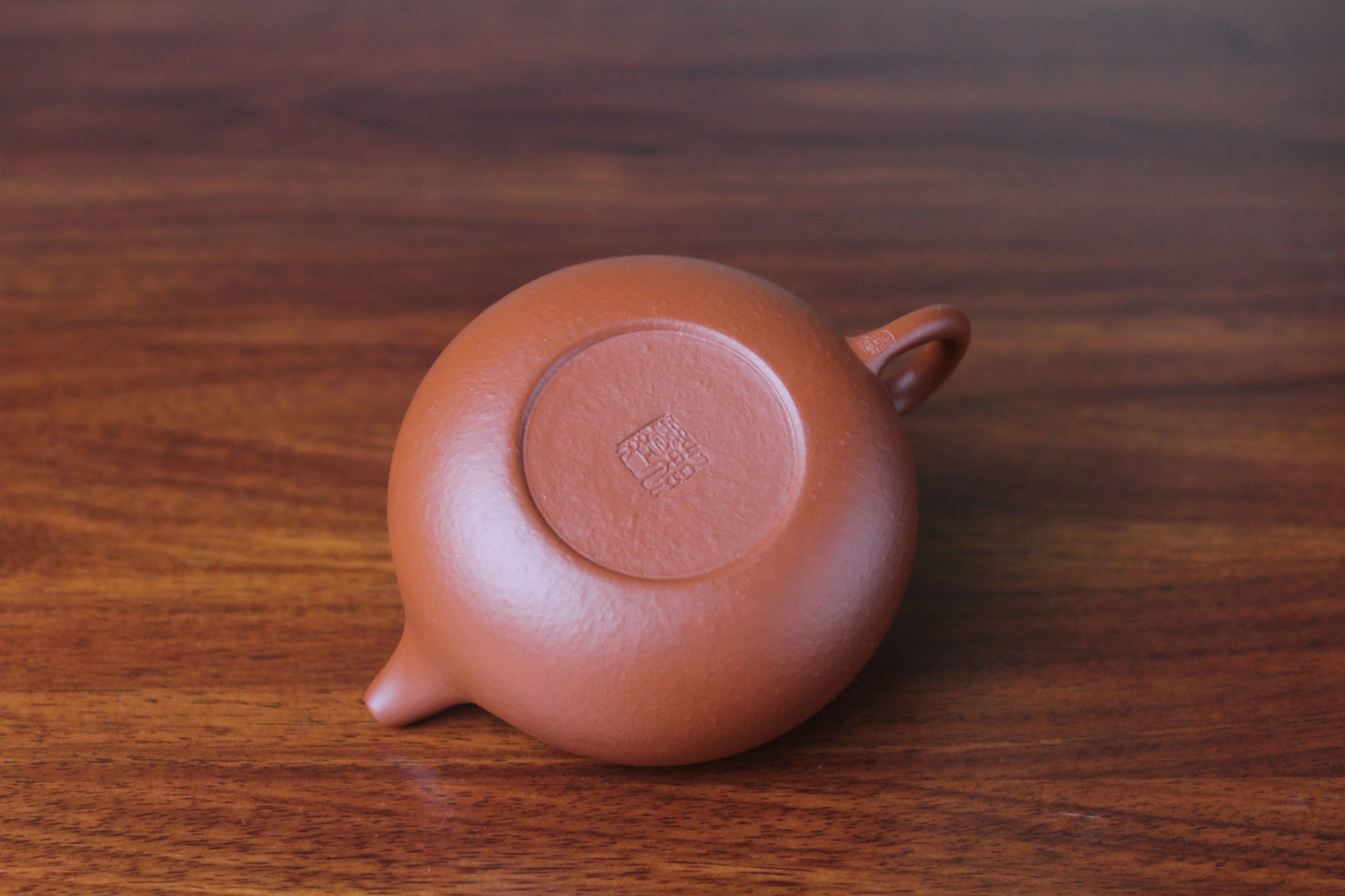Bottom of the chinese teapot fang gu on the table
