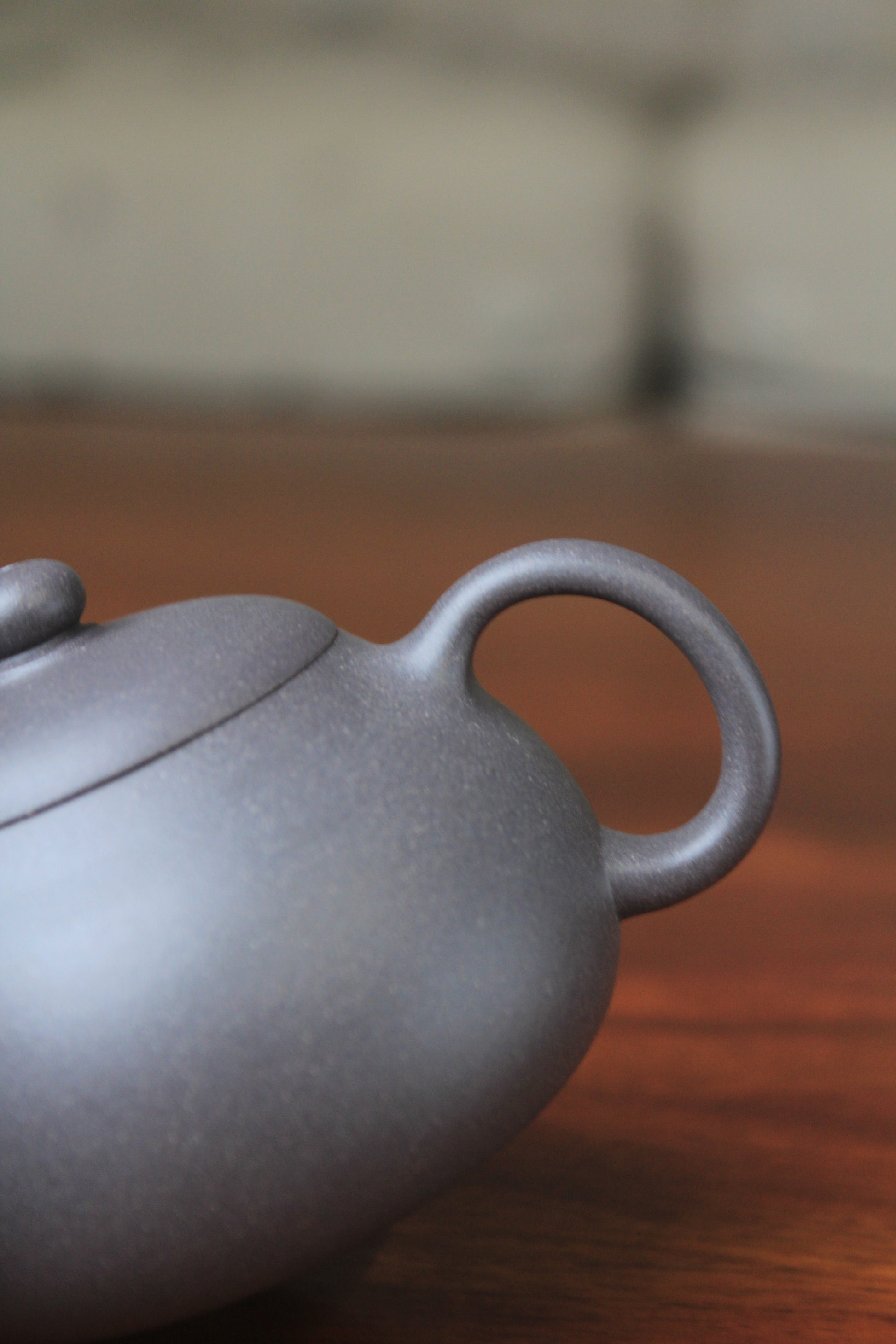 handle detail of chinese teapot xishi on the table