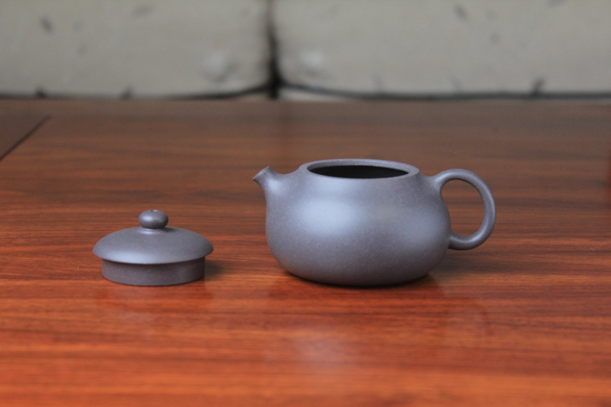 Lid detail of chinese teapot xishi on the table