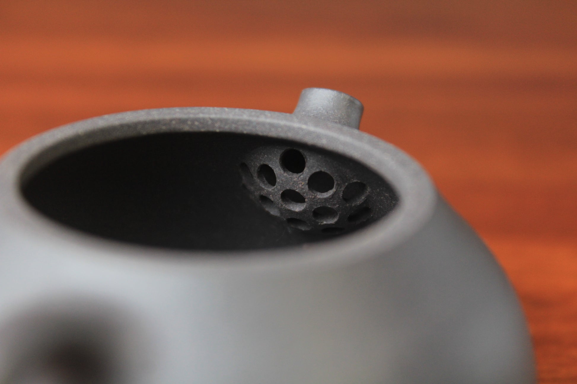 filter of chinese teapot xishi on the table