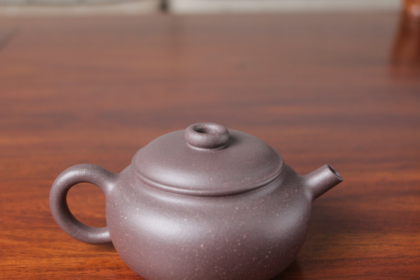 Detail of the Chinese teapot on the table
