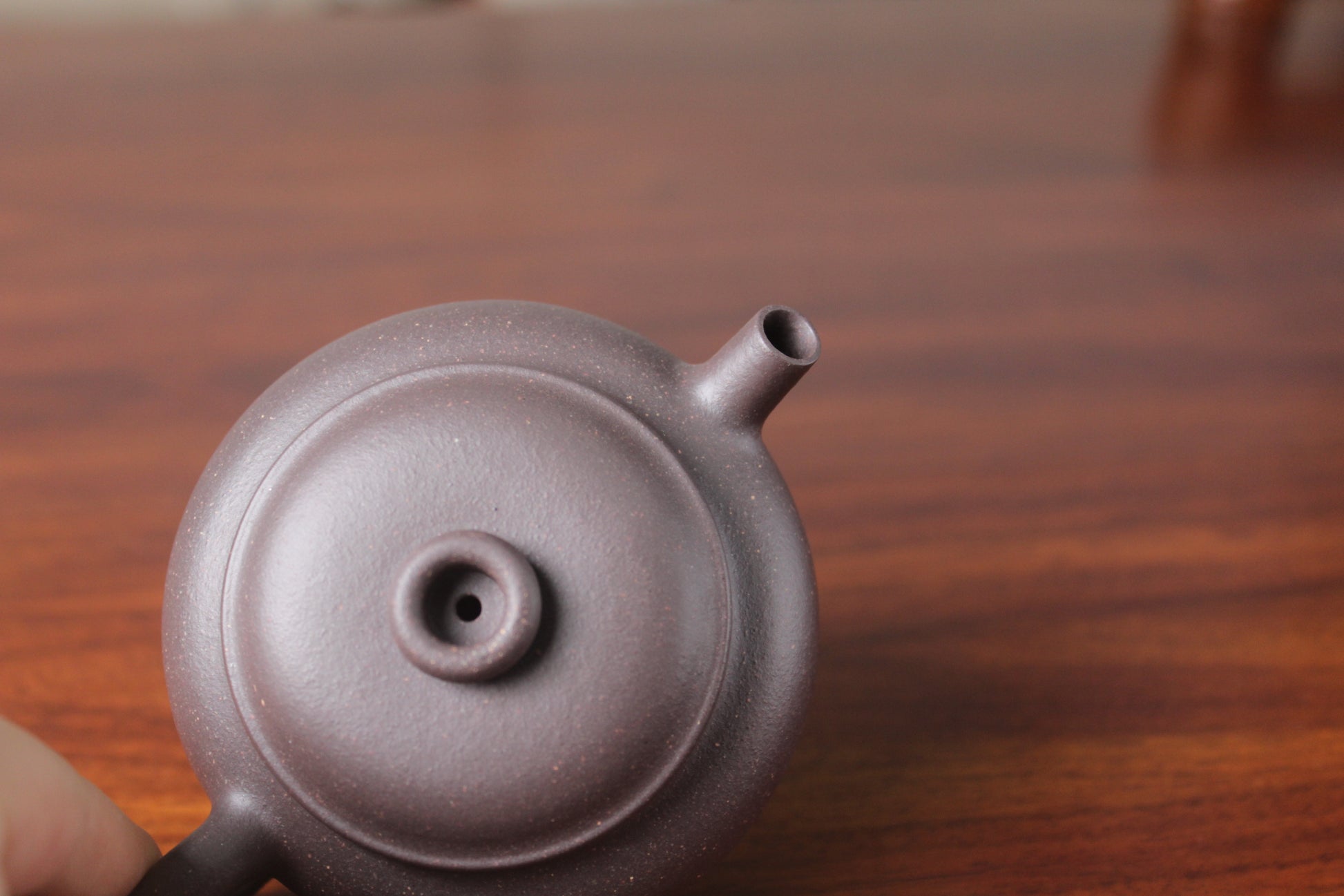 Top view of the Chinese teapot on the table