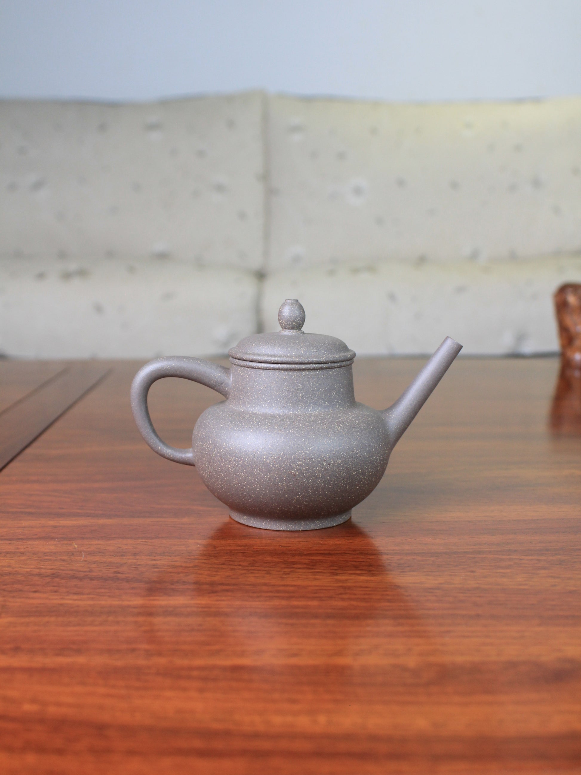 Back of the Chinese teapot on the table