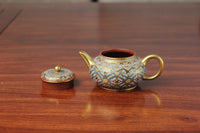 chinese teapot vintage made from purple clay front detail