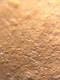 A magnified photo of the raw material of this teapot — original Yixing zhu ni clay.
