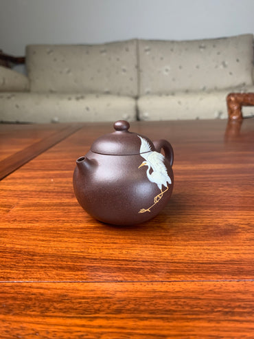 clay tea-pots crane dance right