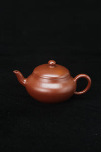 Clay teapot handmade with purple clay from zisha art galley