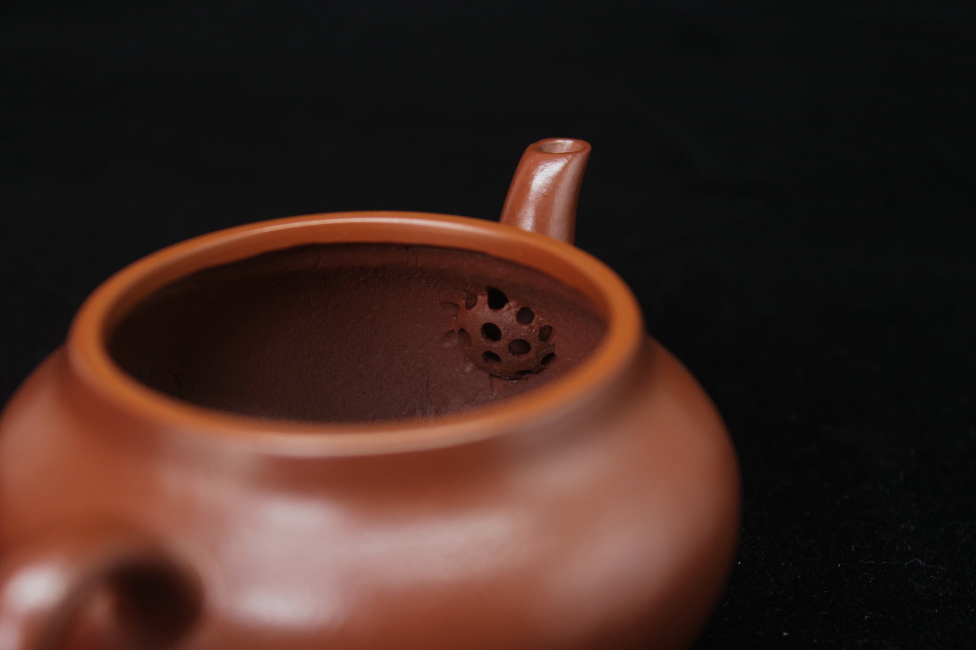 Filter of Clay teapot handmade with purple clay from zisha art galley