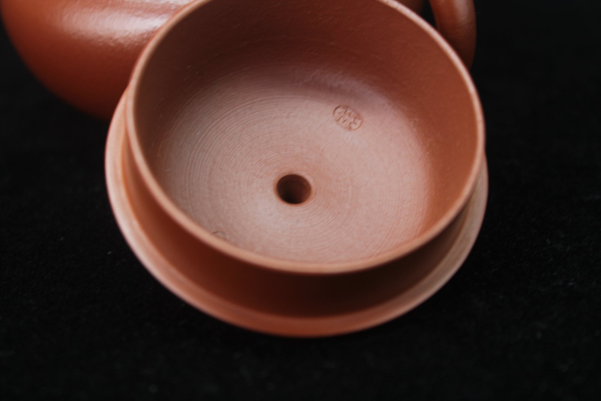 Lid detail of Clay teapot handmade with purple clay from zisha art galley