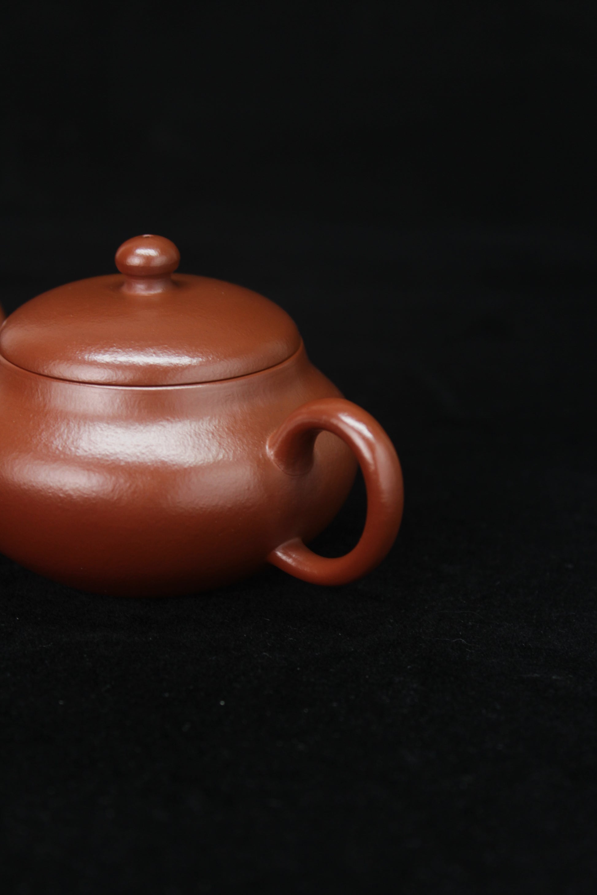 Handle details 2 of Clay teapot handmade with purple clay from zisha art galley