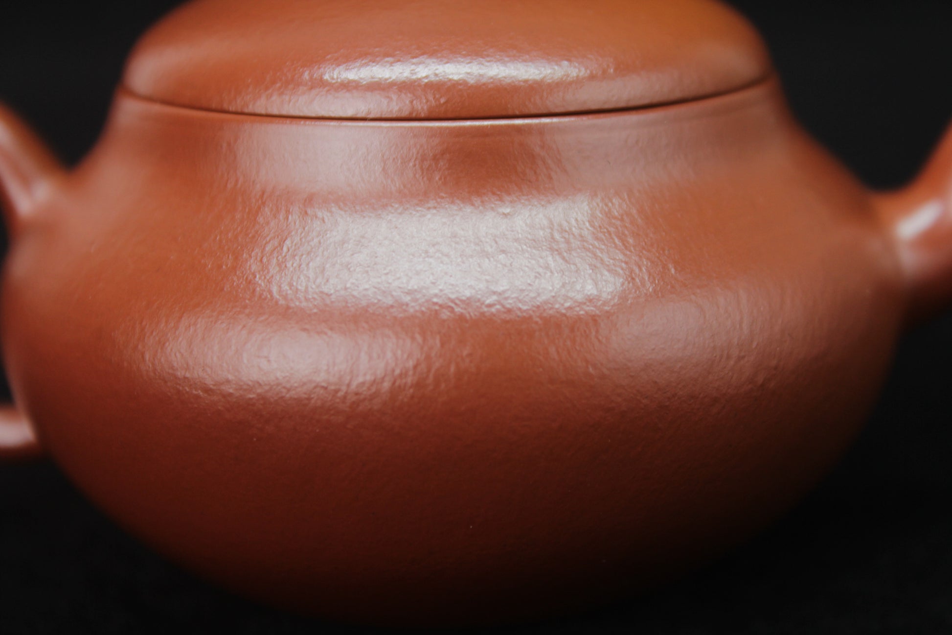 Clay detail of Clay teapot handmade with purple clay from zisha art galley