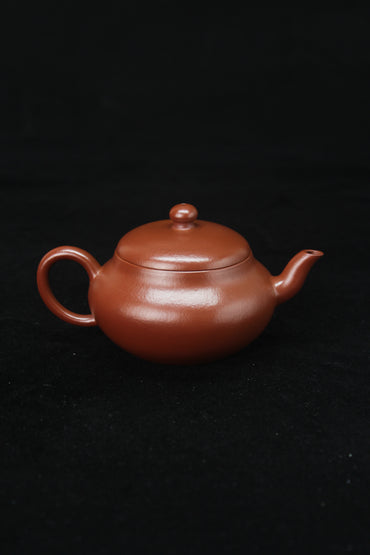Clay teapot handmade with purple clay from zisha art galley back