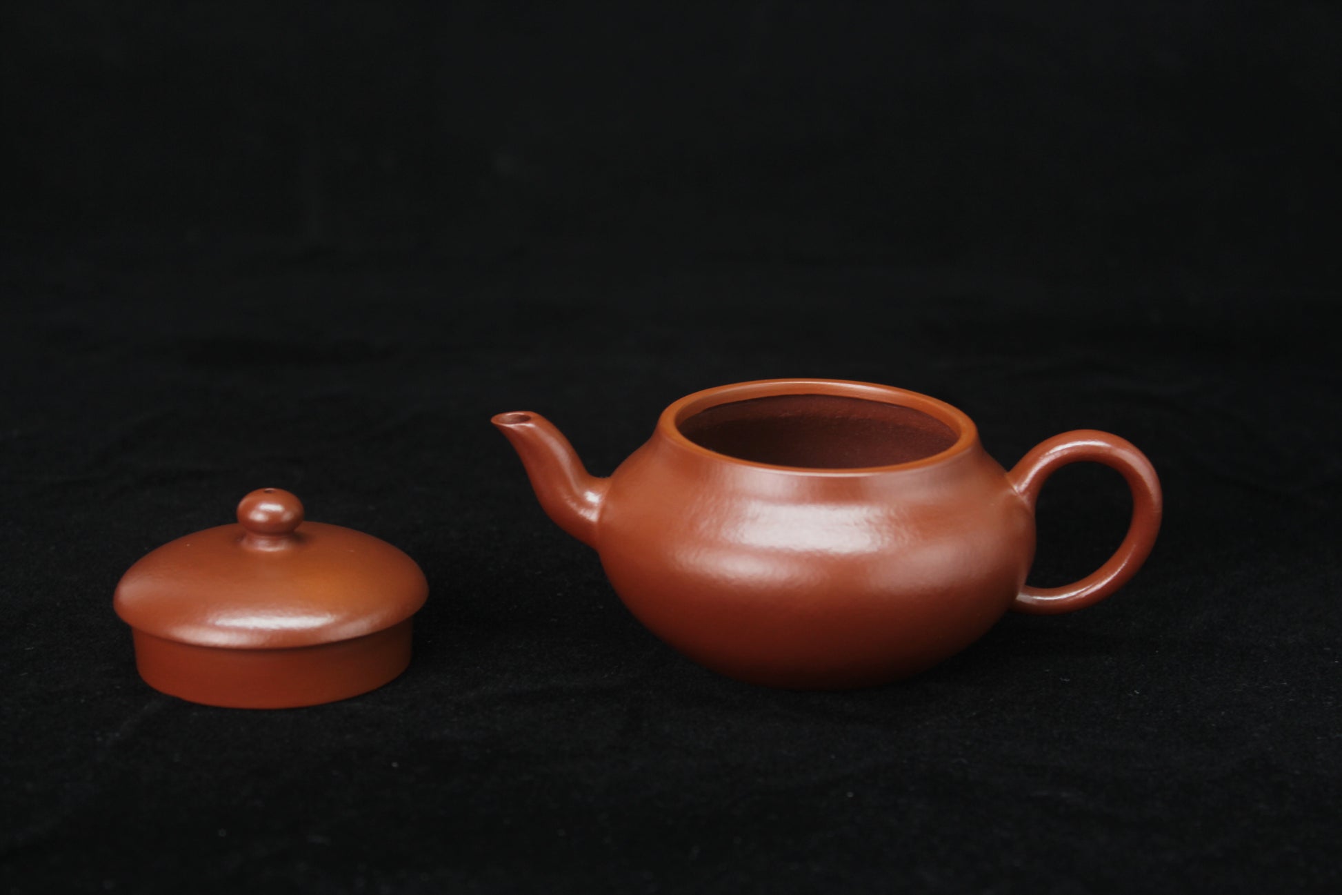 Detail of  Clay teapot handmade with purple clay from zisha art galley