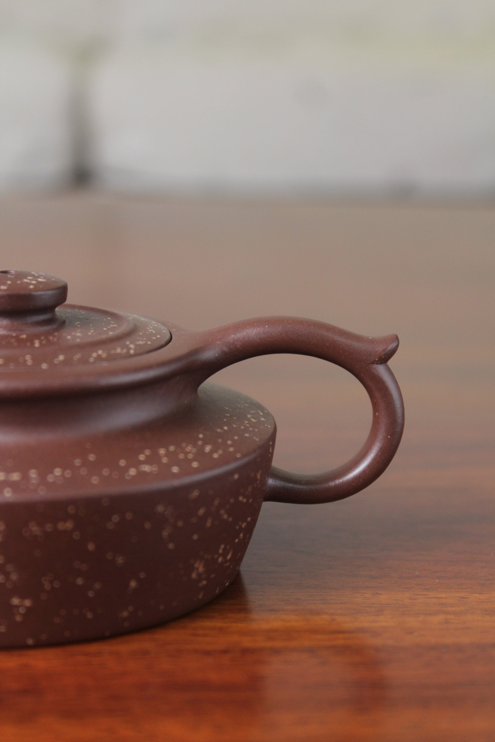 Handle detail of the collectible teapot handmade by teapot artist