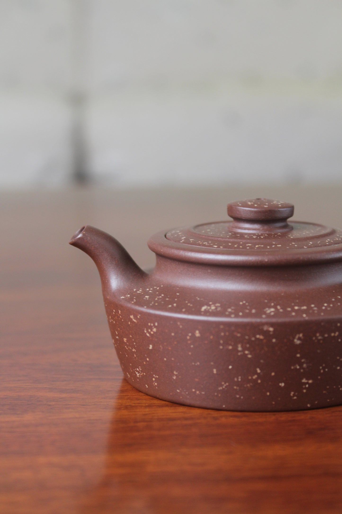 Spout details of the collectible teapot handmade by teapot artist