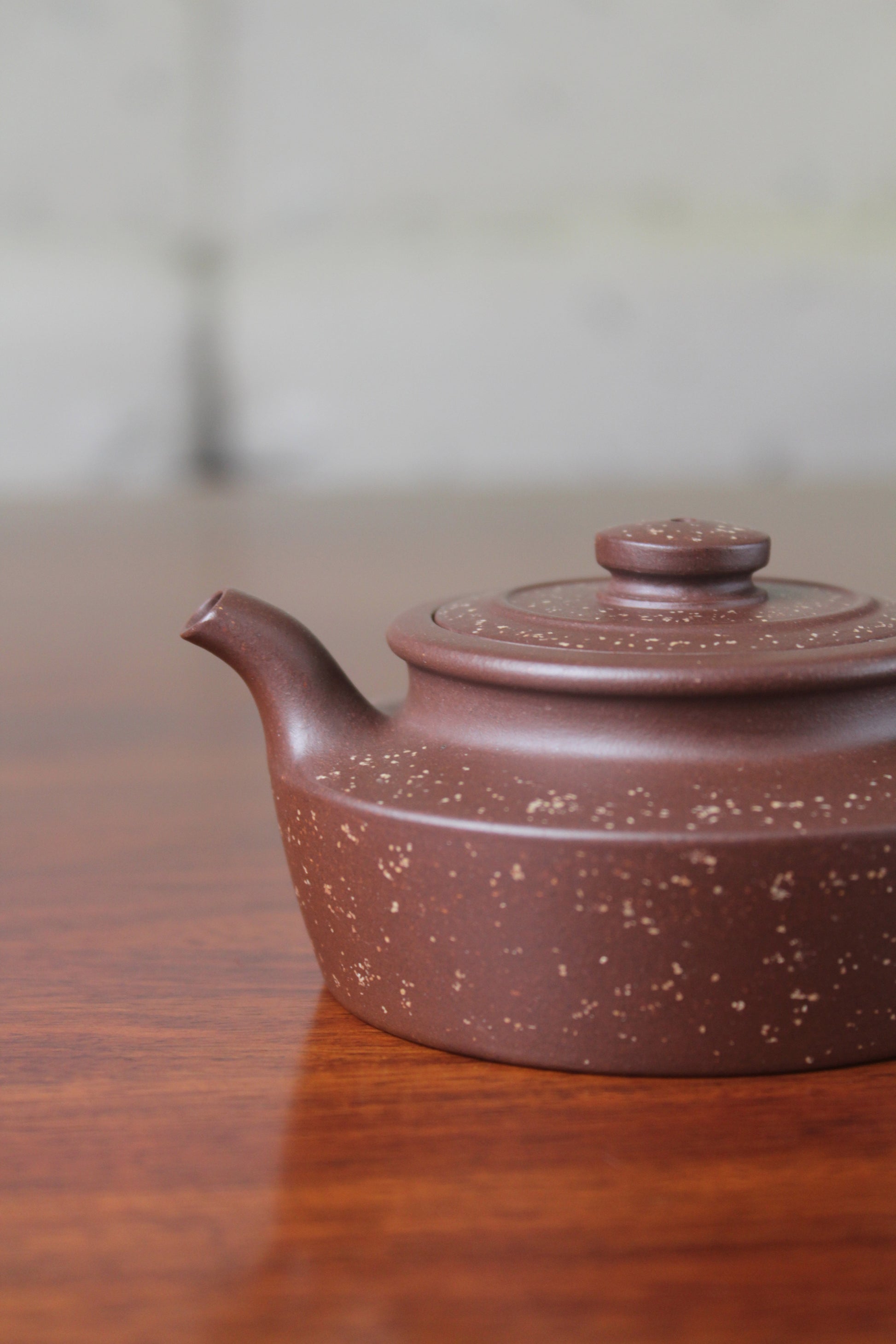 Spout details of the collectible teapot handmade by teapot artist