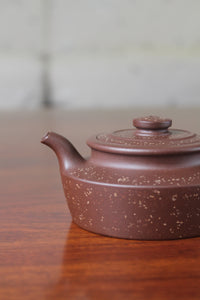 Spout details of the collectible teapot handmade by teapot artist
