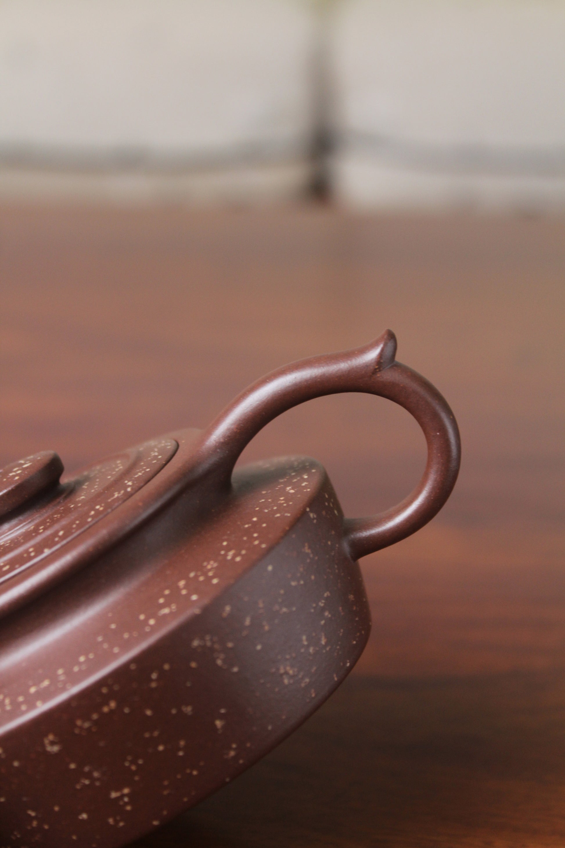 Handle of the collectible teapot handmade by teapot artist