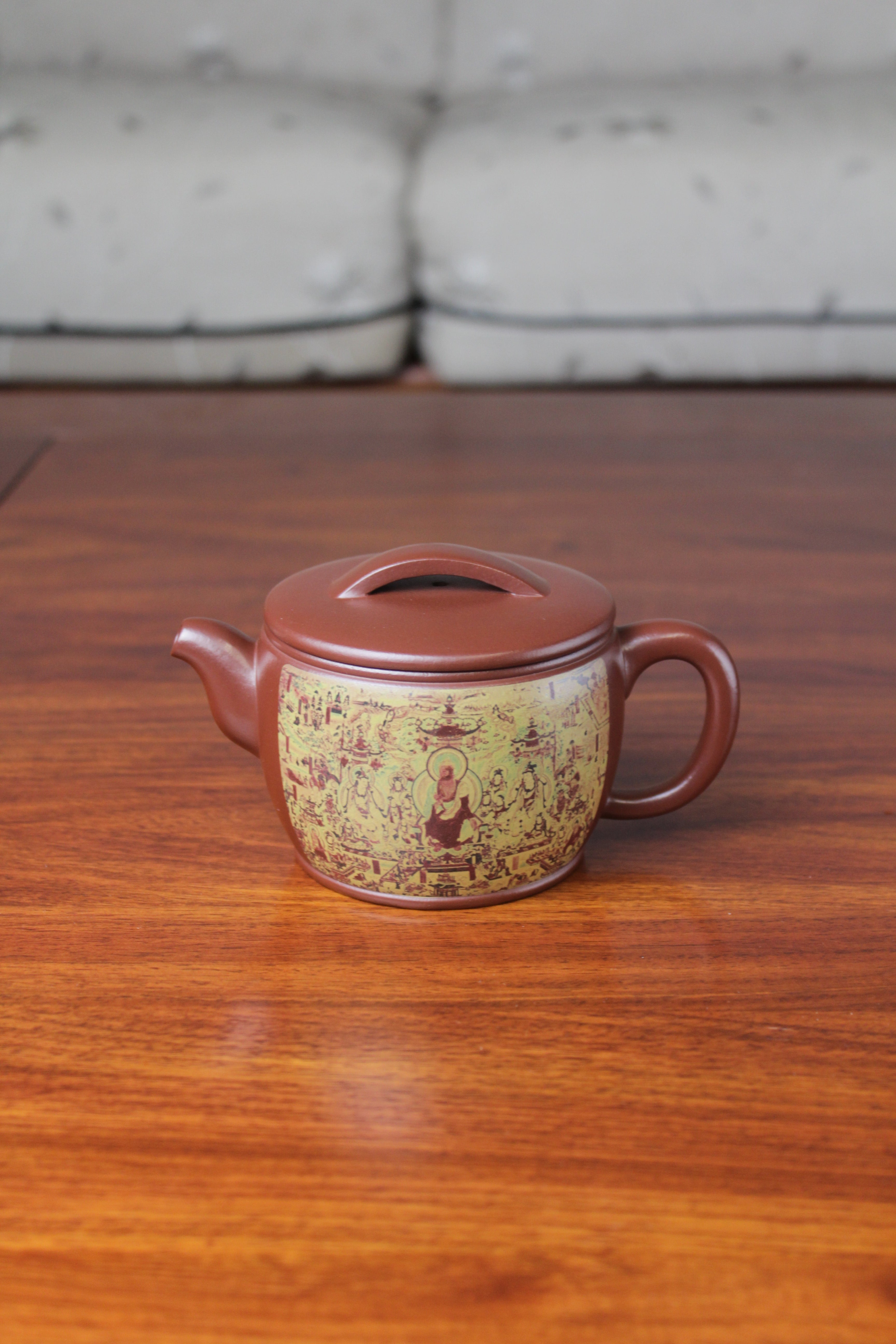 Collectible teapot named han wa on the table