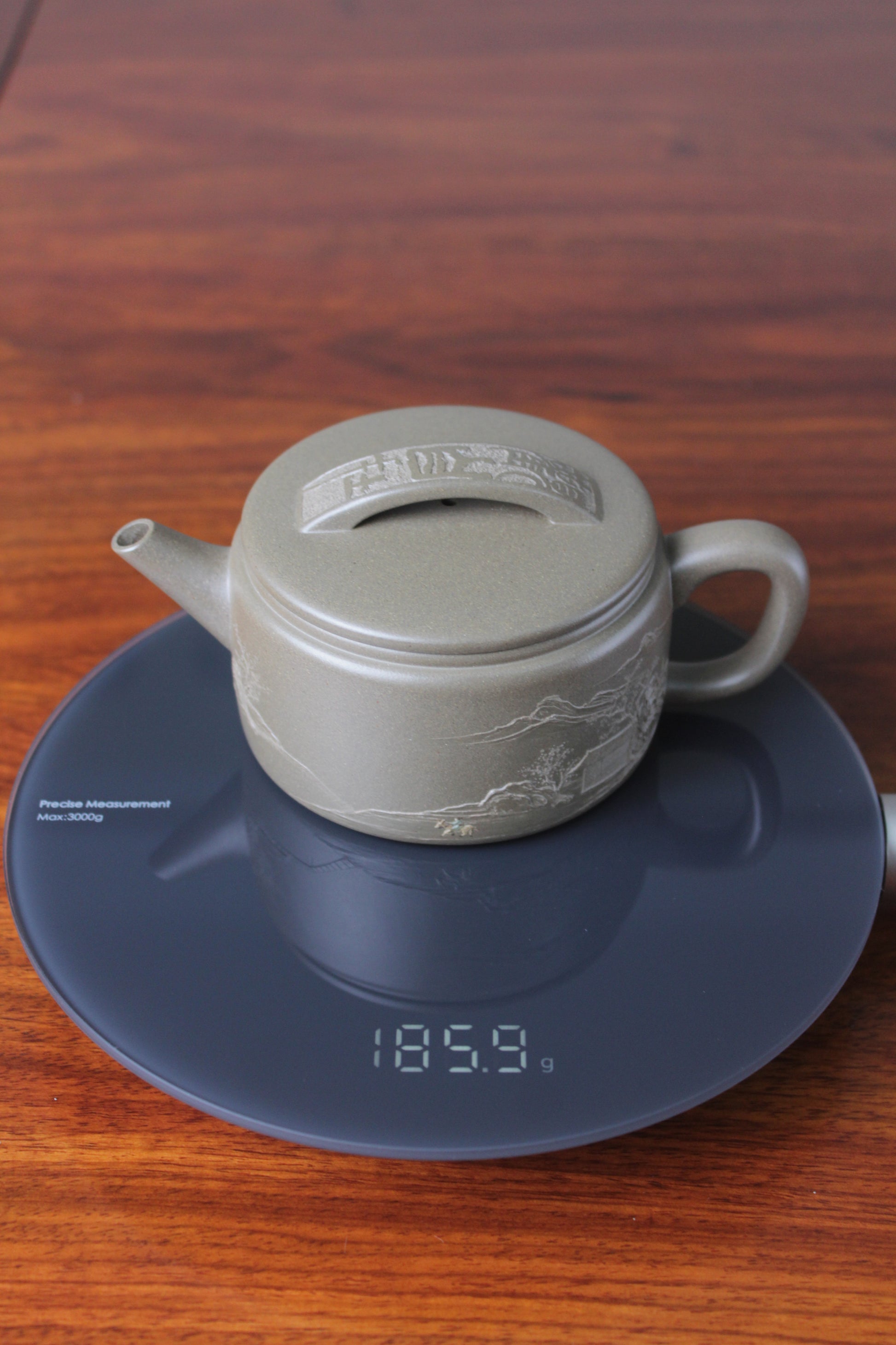 Weight of the collectible teapot han wa